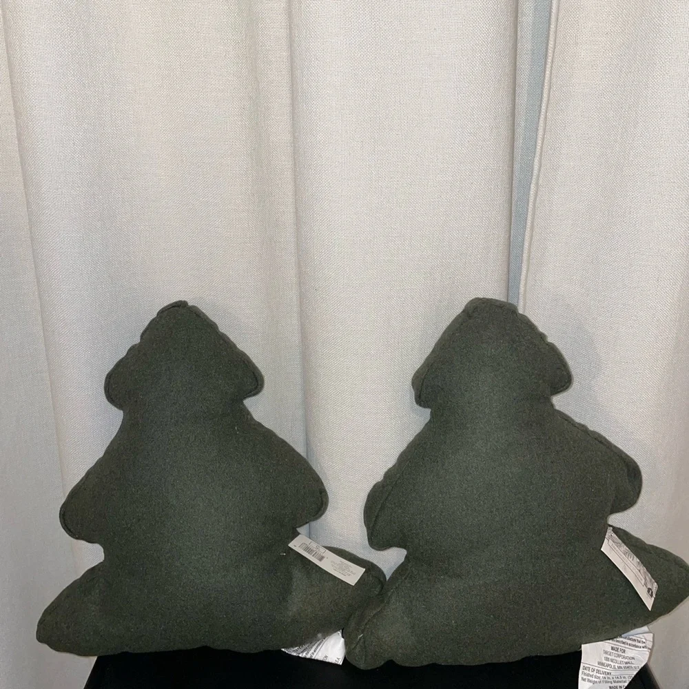 Two green Christmas tree pillows -target bullseye section